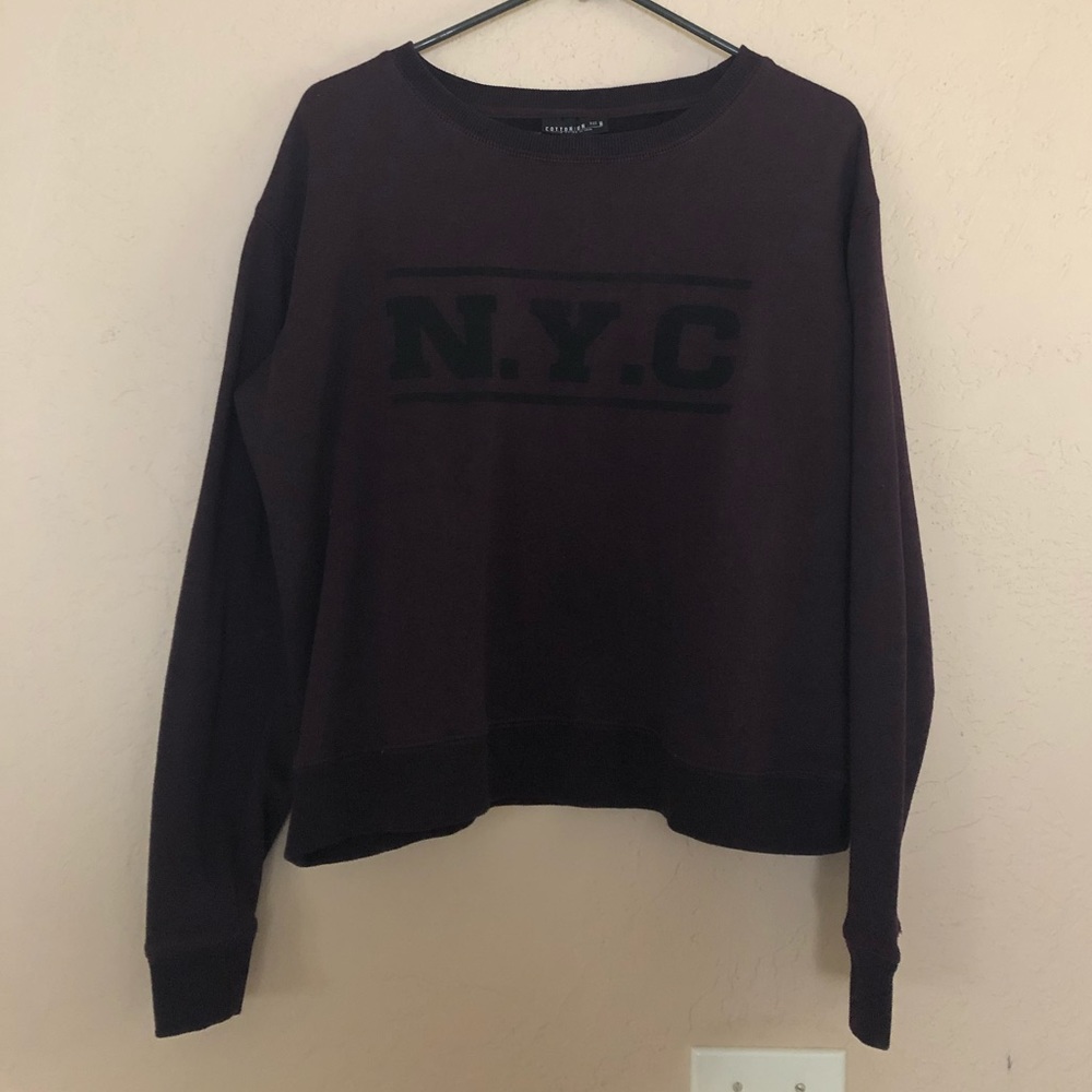 Burgundy NYC logo sweatshirt.